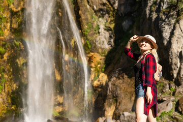 Theth, Albania, Europe. Tourists visiting the beautiful Albanian mountain waterfall