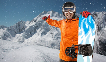 Snowboarder on a background of snowy mountains. Winter sport background. 