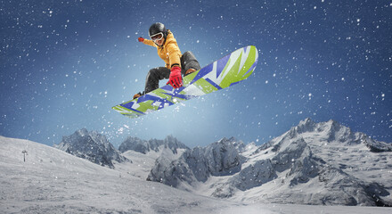 Snowboarder on a background of snowy mountains. Winter sport background. 