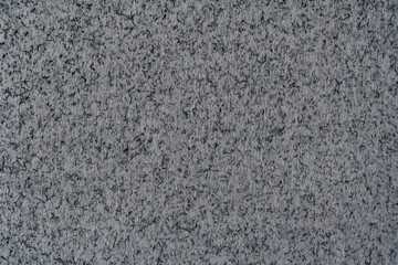 Rough dark gray surface as texture, background
