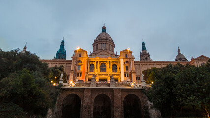 Fototapeta premium The National Palace in Barcelona at sunset, Spain