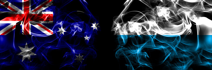 Flags of Australia, Australian vs Germany, Bavaria. Smoke flag placed side by side on black background