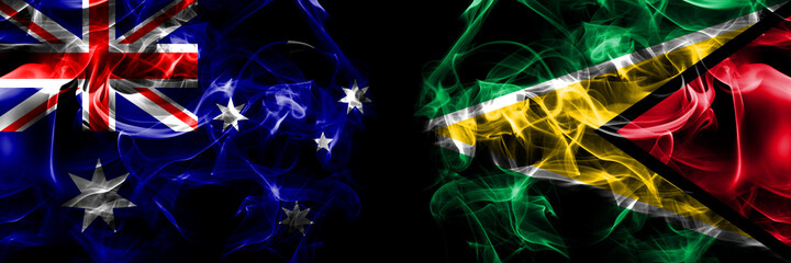 Flags of Australia, Australian vs Guyana. Smoke flag placed side by side on black background