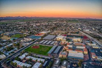 Acrylglasbilder Arizona Aerial View of Sunrise over the Phoenix Suburb of Buckeye, Arizona  © Jacob