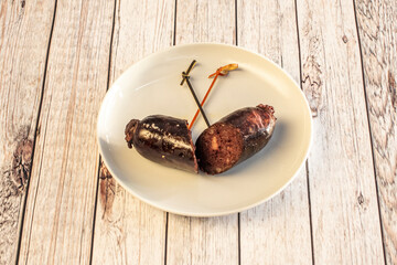 a typical black pudding from the Spanish province of León, whose only ingredients are pig's blood...