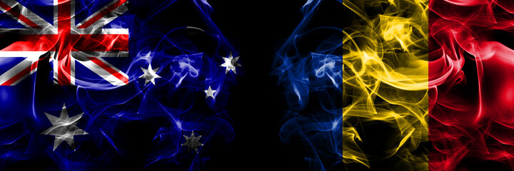 Flags of Australia, Australian vs Romania, Romanian. Smoke flag placed side by side on black background