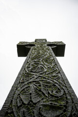 Stone Cross Monument at a Cemetery