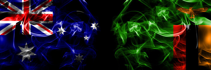 Flags of Australia, Australian vs Zambia, Zambian. Smoke flag placed side by side on black background