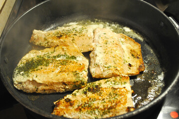 Salmon Frying with Butter and Parsley