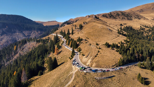 Aerial drone view of a road in Bucegi Mountains in Romania