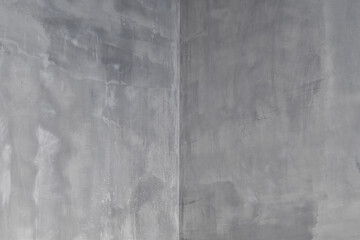 Bare grey cement wall. Concrete texture background. Free space for copy text.