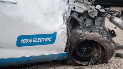 Crashed electric car in severe accident, frontal impact