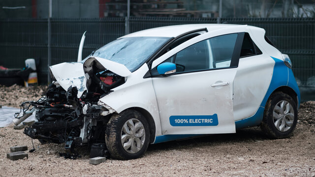 Crashed electric car in severe accident, frontal impact