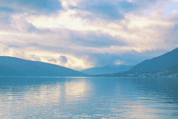 Cloudy misty day. Beautiful Mediterranean landscape. Montenegro, Adriatic Sea. Winter view of Kotor Bay