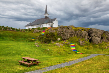 Rainbow staircase leading to Hólmavík Church (Hólmavíkurkirkja) supporting equal rights for LGBT people community. Holmavik, Iceland