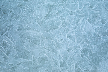Ice texture background. Frost, ice surface. Close up of decorative winter frozen pattern. Top view.