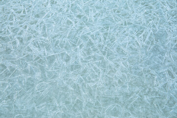 Ice texture background. Frost, ice surface. Close up of decorative winter frozen pattern. Top view.