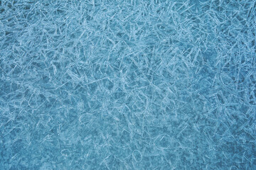 Ice texture background. Frost, ice surface. Close up of decorative winter frozen pattern. Top view.