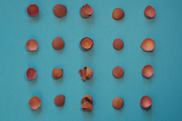 Peel of fresh lychee background, lichi or litchi chinensis skin food pattern