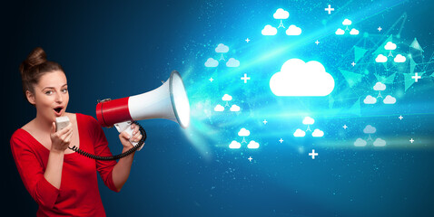 Young person with megaphone and technology related icon