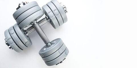 Gray dumbbells on a white background.
