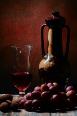 Fototapeta Karafka i kieliszek, czerwone wino. Winogrona  różowe i liczi. Kompozycja martwa natura jako tekstura tła lub na tapetę. obraz