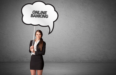 business person in casual holding road sign