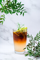 iced layered coffee drink in plastic cup