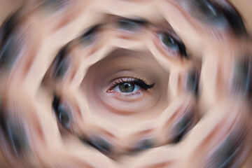 Radial motion blur composition with woman eye in the center, dizzy effect or inner thoughts
