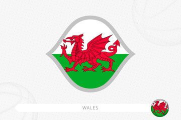 Wales flag for basketball competition on gray basketball background.