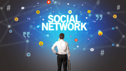 Rear view of a businessman, social media concept