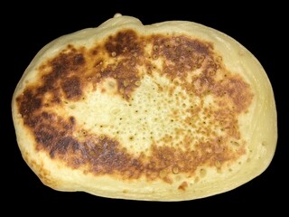 Texture of appetizing fried pancake with holes.