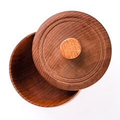 empty wooden round box for salt and spices top view isolated