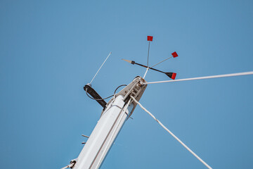 The clicker on the mast of a yacht