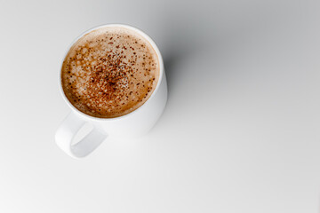 Hot coffee cappuccino in ceramic cup isolated on white background, clipping path included. cappuccino with spices and cinnamon. Cozy morning concept. Hygge.