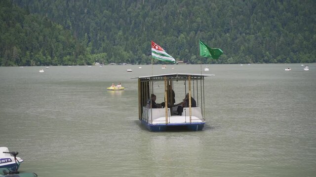 The boat is solar powered. The boat's electric motor runs on solar energy. Big Lake Rizza in Abkhazia