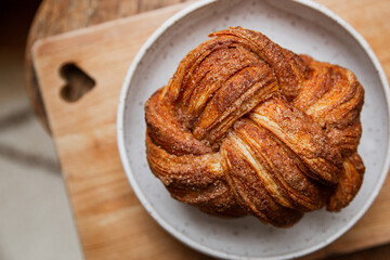 Cinnamon sugar chai twist bread baked treat on a heart cutting board