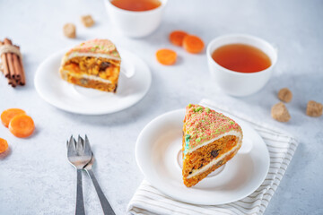 Carrot cake with cream cheese filling in a plate