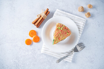 Carrot cake with cream cheese filling in a plate