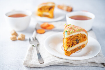 Carrot cake with cream cheese filling in a plate