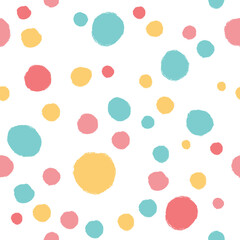 Simple seamless background in polka dots. Vector pattern in pastel colors.