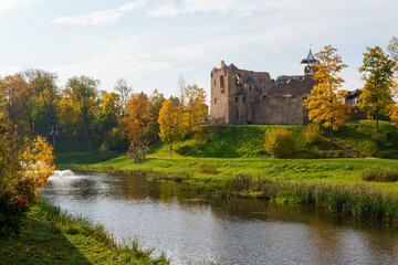 Castle by the river in autumn