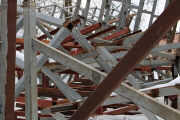 Pile of old rusty metal beams