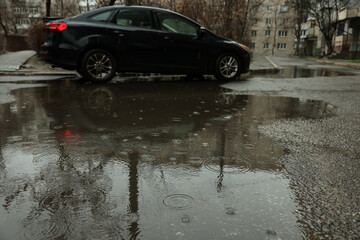 View of pouring rain on city street