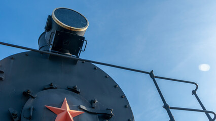 The old spotlight of the Soviet locomotive of the early 20th century. Retro light in front part of train.