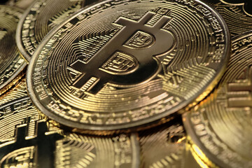 Fototapeta na wymiar Crypto currency, bitcoin. BTC, Bit Coin. Blockchain technology, bitcoin mining. Macro shot of rotating bitcoins