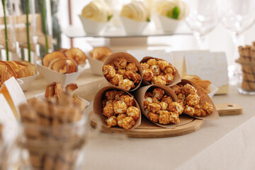 Tasty treats on table in room. Sweet buffet
