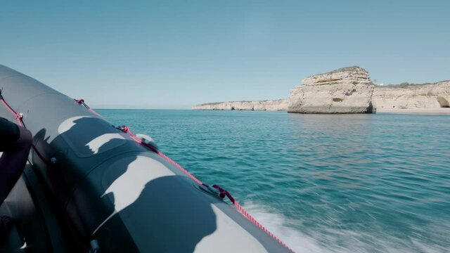 Travelling along the Portuguese coast by dinghy boat in the summer