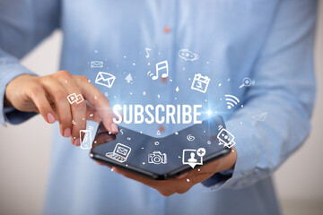 Businessman holding a foldable smartphone, social media concept