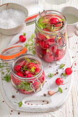 Healthy pickled radishes made of organic and fresh vegetables.